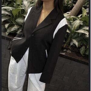 Black blazer with white detailing